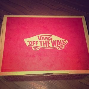 Black and white high top vans